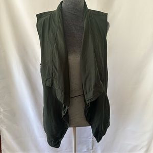 Stylish loden  green vest.